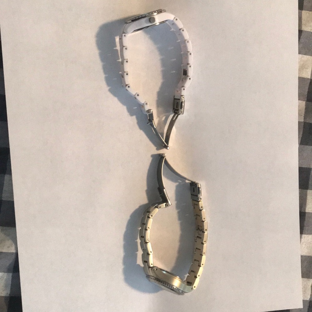 Gently used fossil watches! Gold and white.